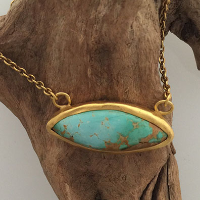 Turquoise set in 22k